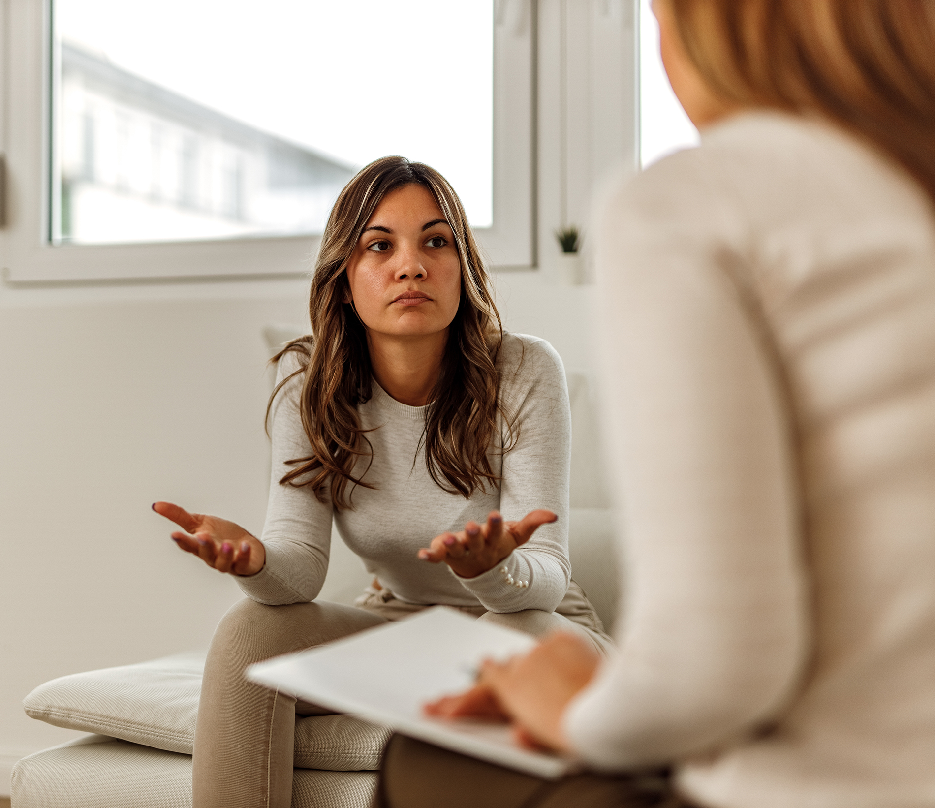 Patient talking about her mental health with professional